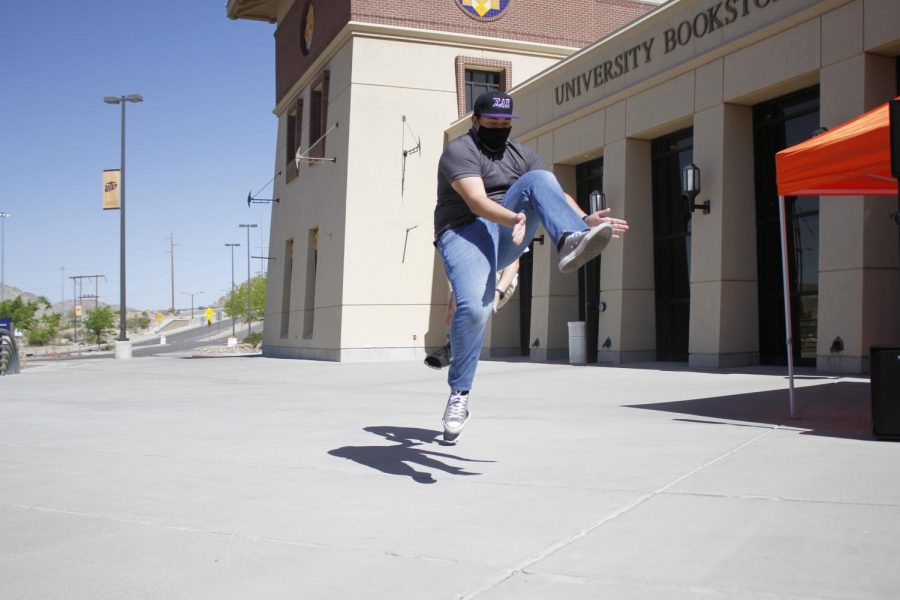 Luis Suira dances in front of the UTEP bookstore on April 7th 2021 