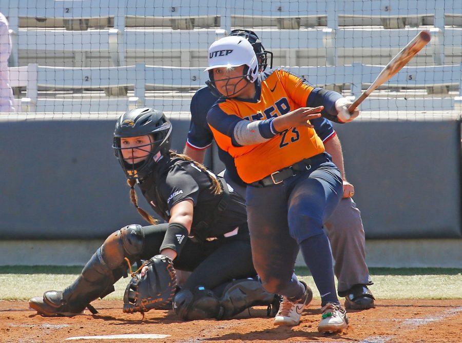 UTEP  sophomore  third  baseman  Kasey  Flores  looks  on  as  she  makes  contact  with a pitch versus Southern Miss April 2.