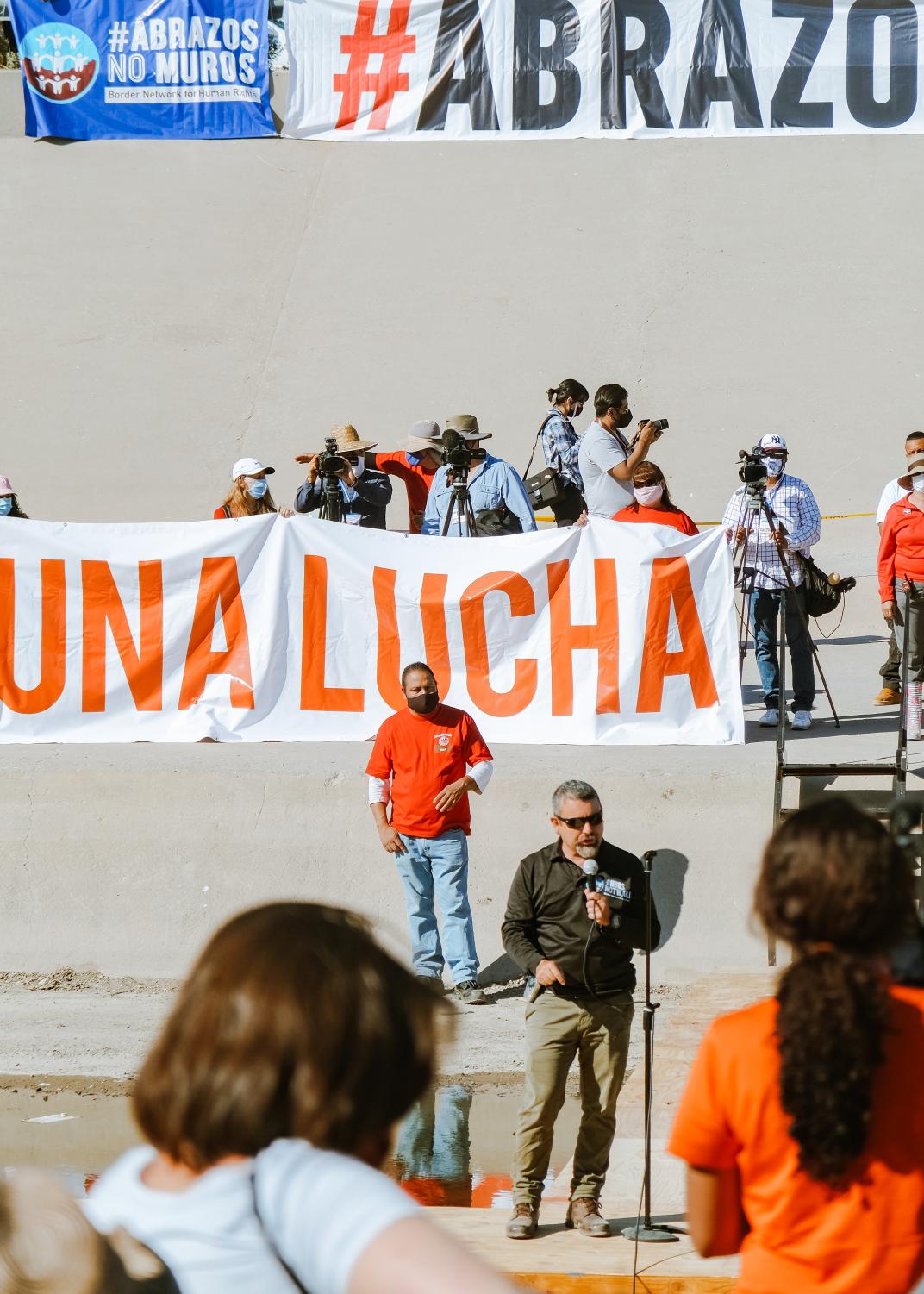 Families+separated+by+U.S.-Mexican+border+reunite+for+three+minutes+at+%E2%80%98Hugs%2C+Not+Walls%E2%80%99