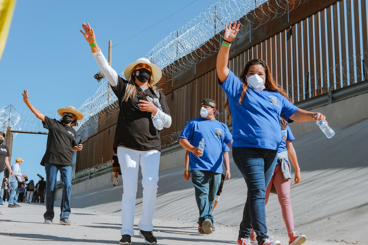 Families+separated+by+U.S.-Mexican+border+reunite+for+three+minutes+at+%E2%80%98Hugs%2C+Not+Walls%E2%80%99