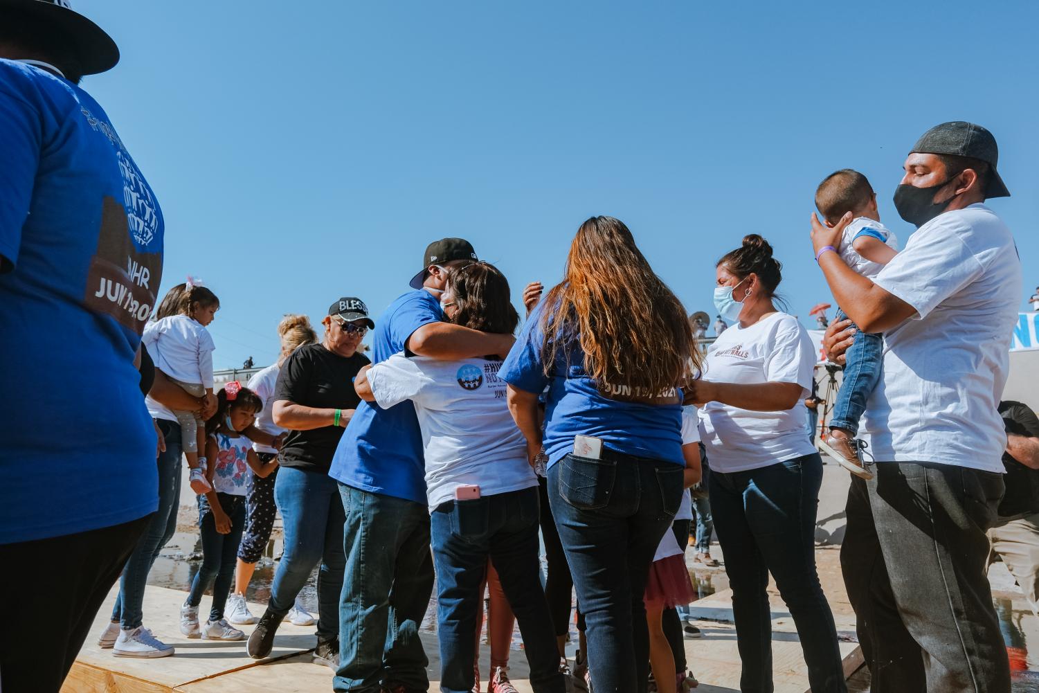 Families+separated+by+U.S.-Mexican+border+reunite+for+three+minutes+at+%E2%80%98Hugs%2C+Not+Walls%E2%80%99