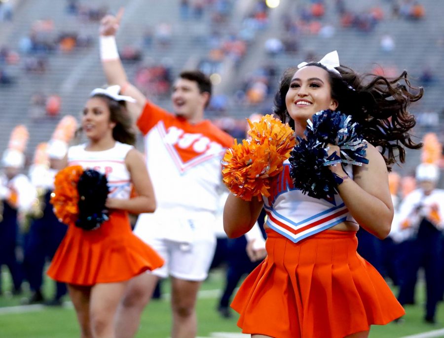 Sara Serros, UTEP Cheerleader and a junior forensic science major, performs at Saturdays football game against UNM.