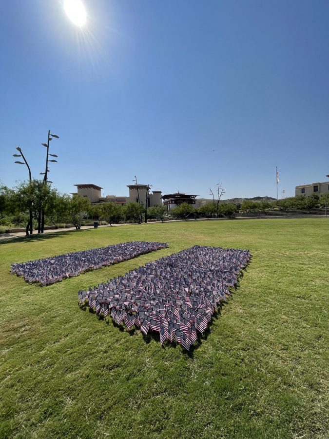 Rows of American flags were placed on the lawn of the Centennial Plaza as a solemn reminder of the tragic events of Sept. 11, 2001 at The World Trace Center.