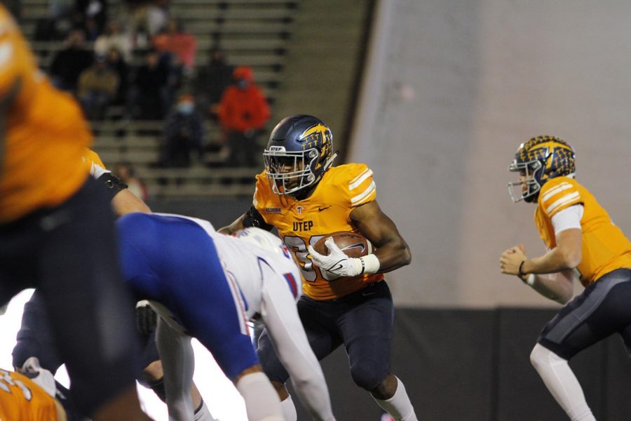 Deoin Hankins runs the ball through the LA Tech defense on October 16, 2021.