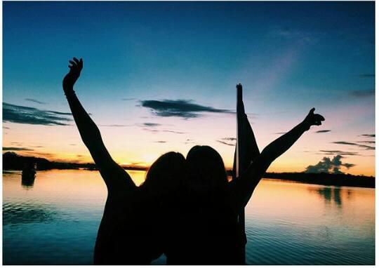 Students from Rotary International Youth Exchange Program in the Amazon River. Sofia Terrazas (left) Mahé Parisse (right) / Photo courtesy of Chiara Koch 