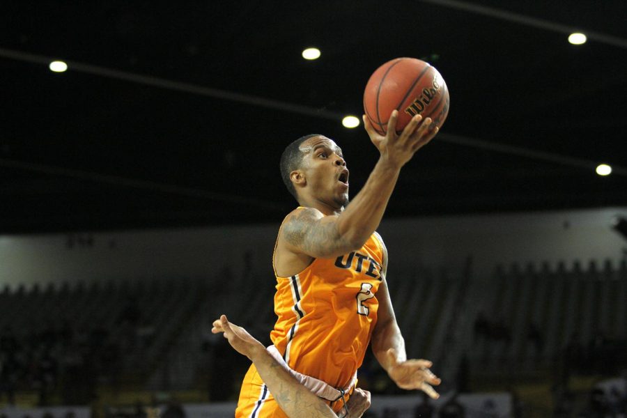 Guard Souley Bourn shoots a three pointer against NMSU for the battle of I-10 on Nov. 13, 2021, at the Pan American Center 