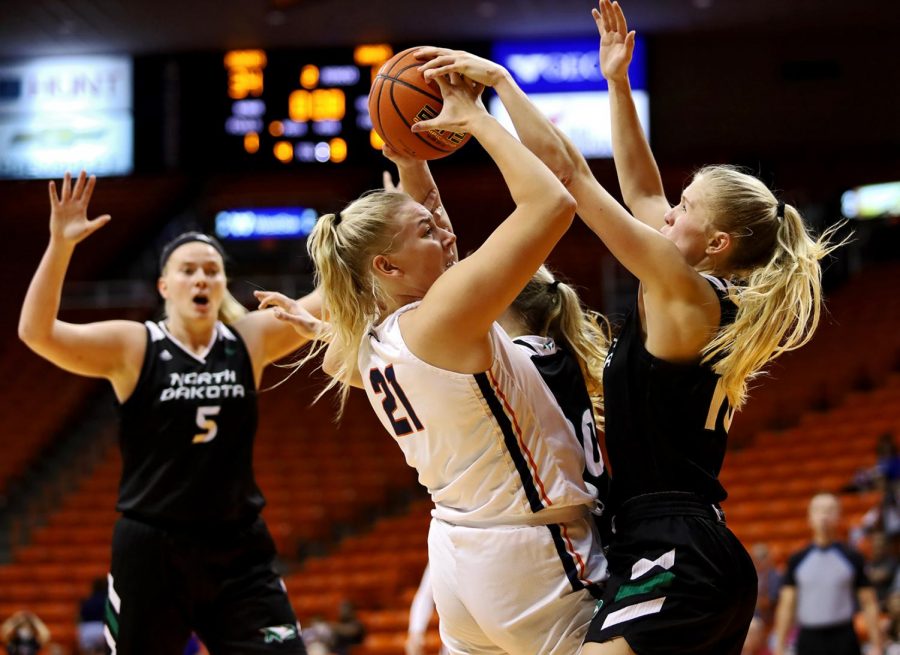 Elina Arike tries to grab the ball during the women’s home game against North Dakota on Nov. 13. 