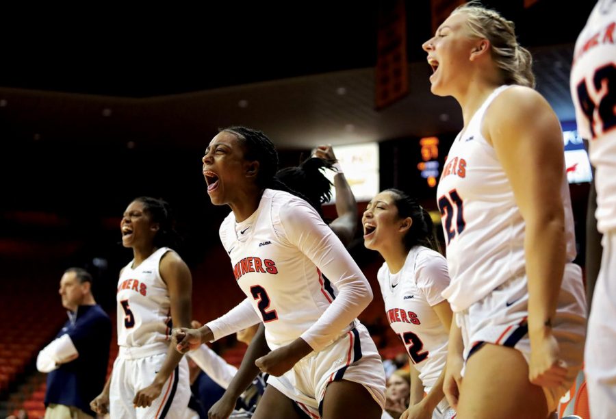 Teal Battle along with her teammates scream for joy during the last quarter of the game against St. Marys University during their home game on Nov. 7 at the Don Haskins Center,.