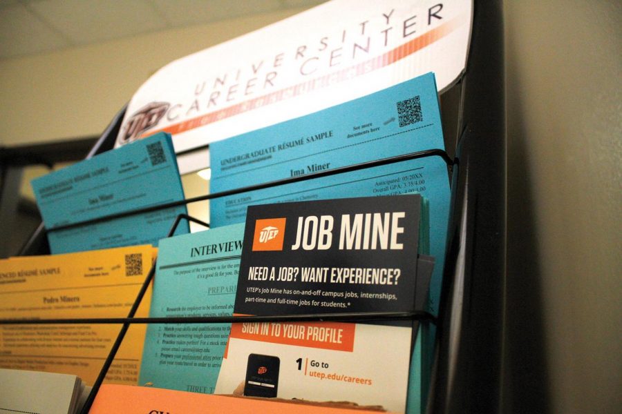 A flyer for Job Mine alongside multiple career ready pamphlets sits outside the Career Center in room 103 in the Union West.