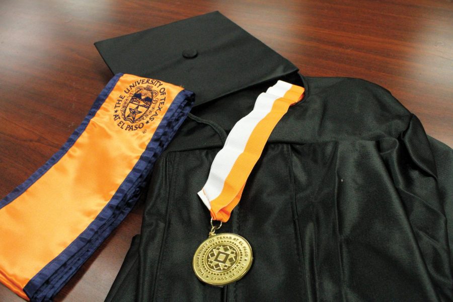 Graduation cap, gown and medal packets for upcoming graduates are available at the University Bookstore.