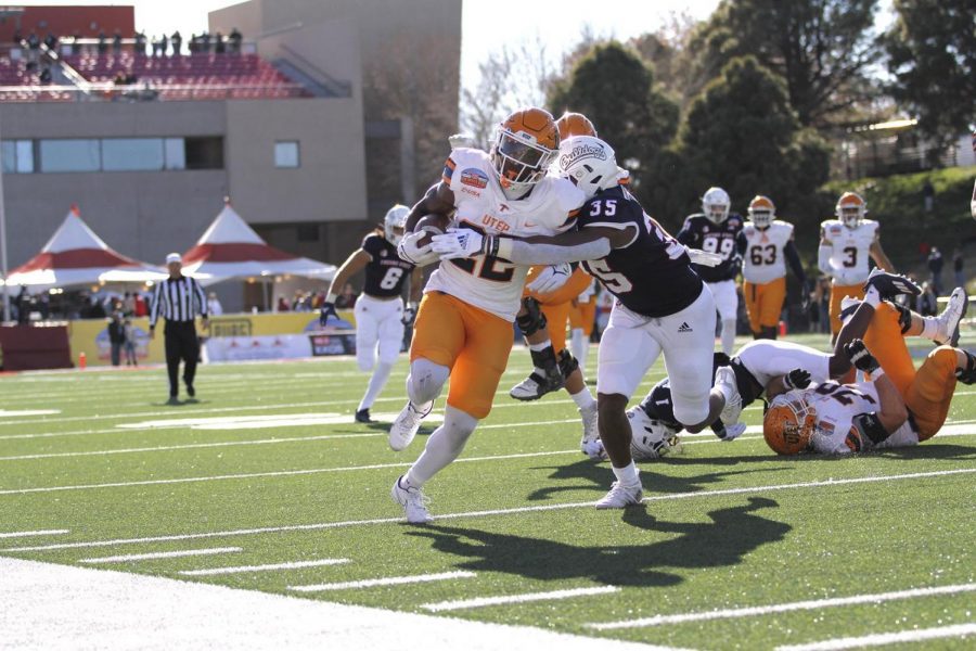 Running back Ronnald Awatt runs down the field against Fresno State on Dec. 18,2021, at University Field 