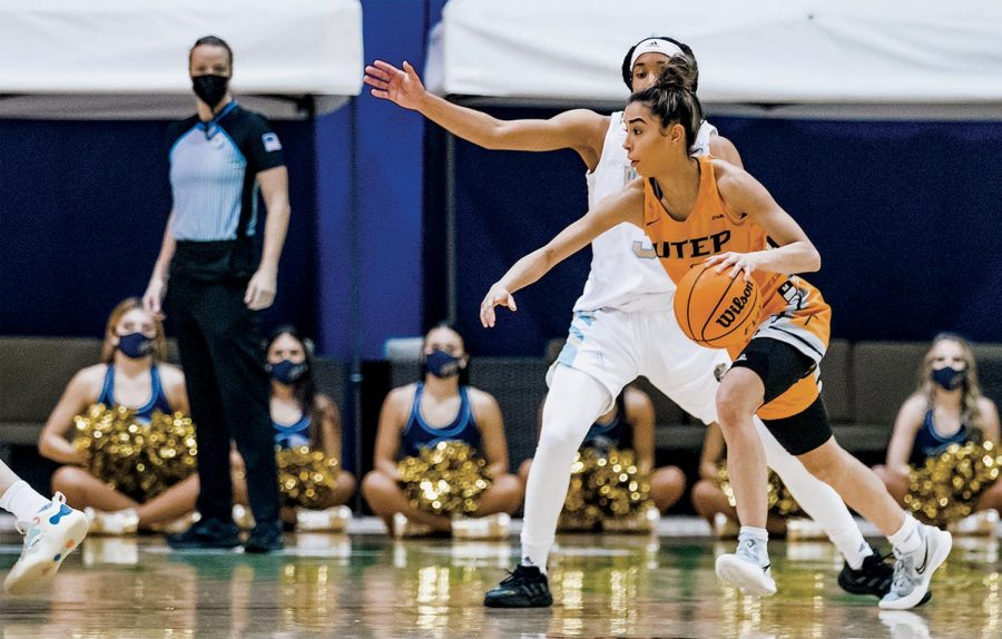 Sophomore guard Katia Gallegos looks to get around the FIU defender on Jan. 30 at the Ocean Convocation Center.