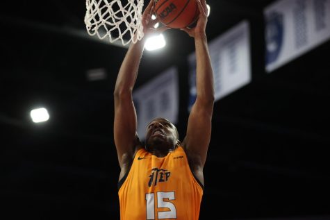 UTEP forward Alfred Hollins dunks the ball in a matchup against Old Dominion. The Miners took a victory in overtime, 78-70. 