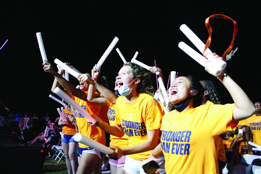 Members of the UTEP Volleyball team cheer during the first annual UTEP Gold Rush at the Centennial Plaza on Aug. 23, 2021.