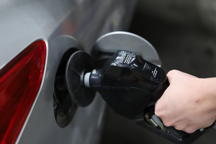 Local el pasoan pumping gas during the hight of gas prices.  