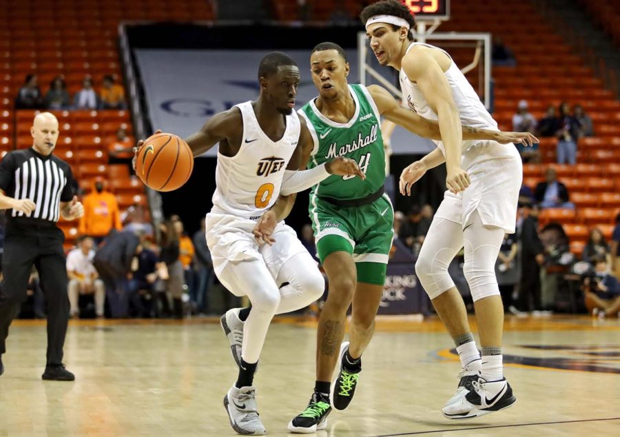 Souley Boum and Tydus Verhoeven play offense against Marshall University Feb. 13 at the Don Haskins Center. 