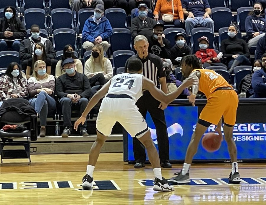 Jamal Bieniemy plays offense against Rice University player Feb. 5 in an away game. 
Photo courtesy of Mark Brunner.