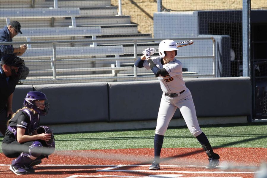 Batter Ilena Santos concentrates at the Helen of Troy Softball Field on Sunday Feb. 13, 2022. 