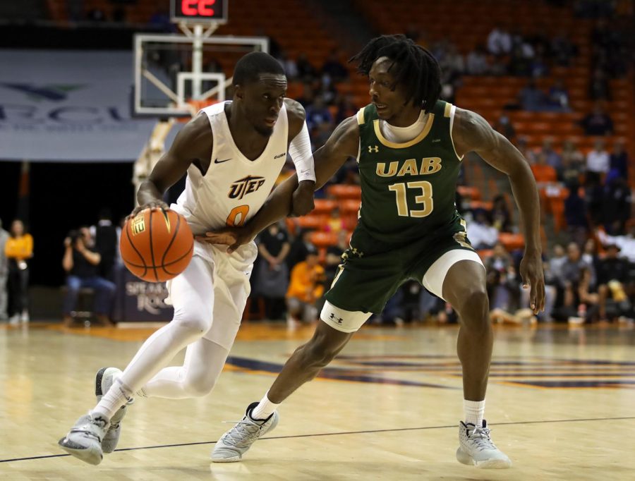Junior point guard Souley Boum plays offense against the University of Alabama at Birmingham.  