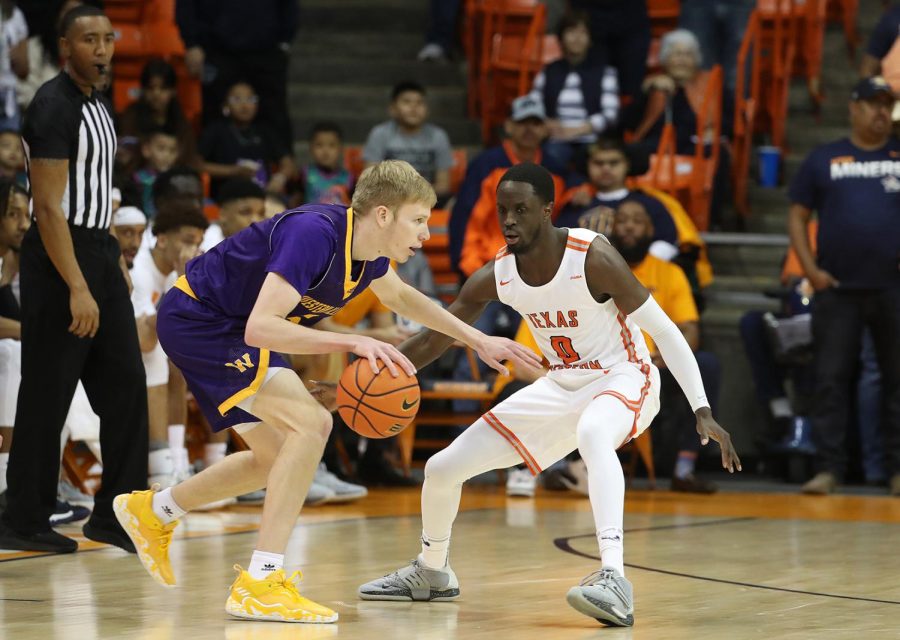 Junior guard Souley Boum lines up against a Western Illinois opponent at the Don Haskins Center on March 19 for round one of the CBI Tournament. Photo credit of Ruben Ramirez.