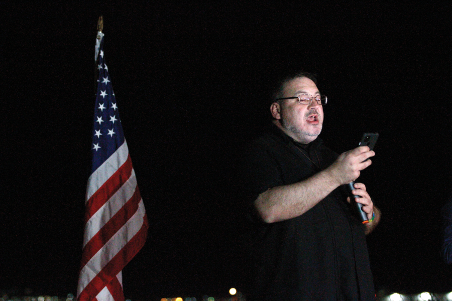 Pastor Antonio Brown says a prayer in solidarity with Ukraine at Tom Lea Parkin El Paso on Feb. 28. 