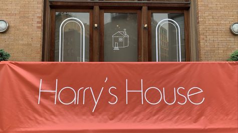 Harry’s House banner in front of exclusive Harry Styles pop-up shop on Canal Street in New York City. Photo courtesy of Itzel Giron.
