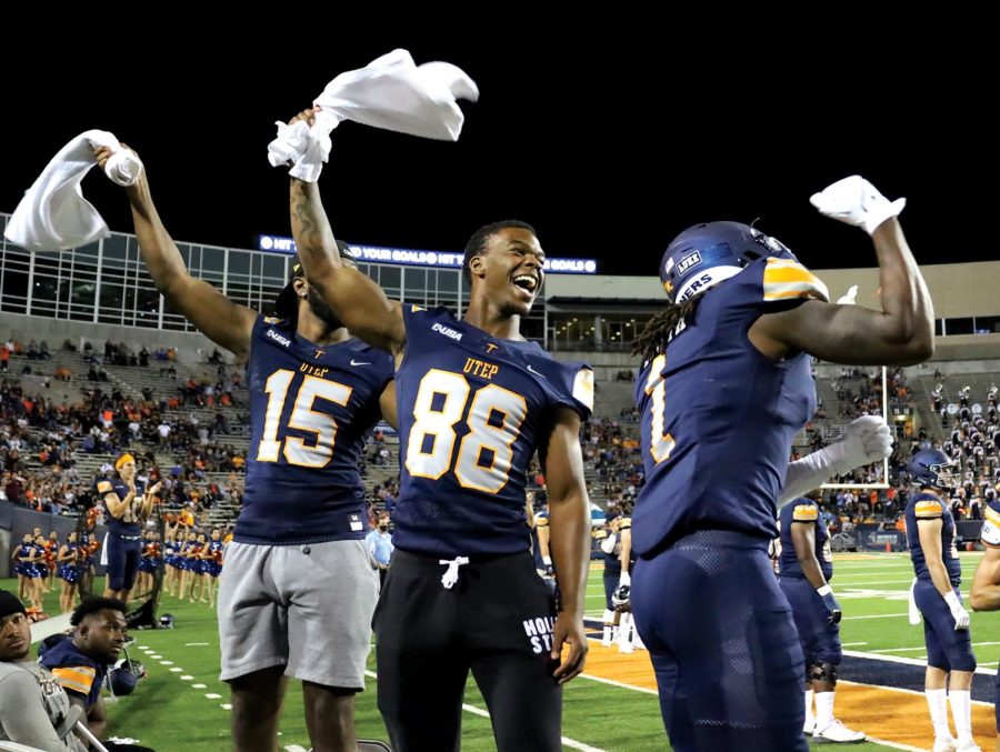 PhotoWide receiver Mister Chavis, cornerback Walter Neil, and defensive back Verenzo Holmes celebrate after a touchdown Oct. 2, 2021.  Prospector File Photo.