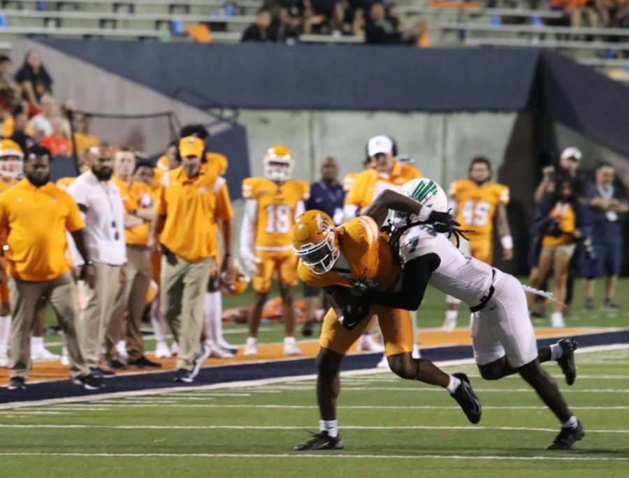 The Miners struggle to move the ball up field as the Mean Green secondary stops them. 
 