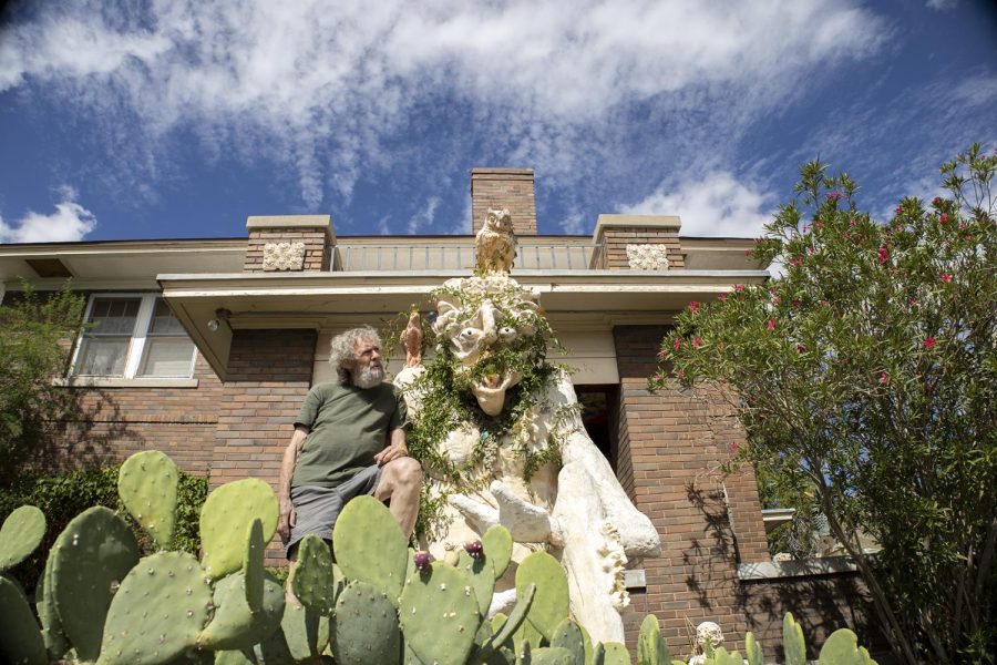 His larger statue, “The Water God” made by rebar structure, metal lathe, cement and stucco, has multiple faces to represent its nonconforming gender in order to represent mankind as well as vines representing how our history wraps around us.  