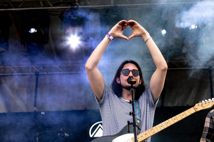 Lead singer of Melancholy 10, Che Ulibarri, makes a heart with his hands after the finish performing. 