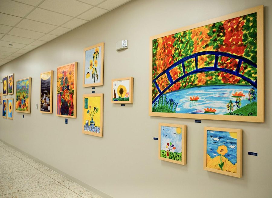 The sunflower art display is located at the Downtown Branch and displays artwork from pediatric oncology patients in El Paso.