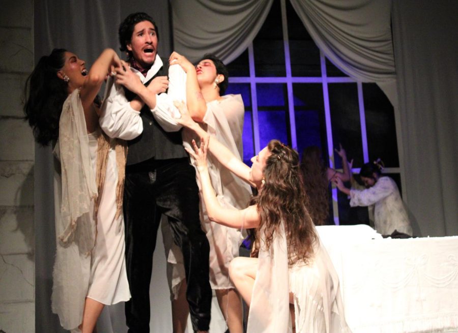 Hector Azurmendi as Dracula, with Natalia Sosa Quiroz, Paula Vasquez, and Ava Trousdale as the Vixens, at the first “Dracula” showing Friday, Oct. 14, at the El Paso Playhouse. 