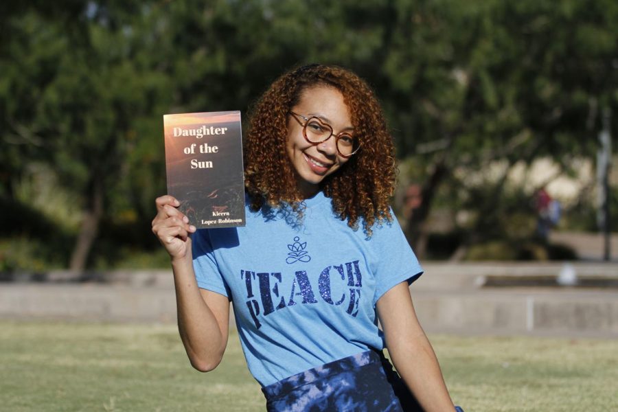 UTEP+student+Kierra+Lopez-Robinson%2C+organizational+and+corporate+communication+major%2C+self-published+her+debut+collection+of+poems%2C+%E2%80%9CDaughter+of+the+Sun%2C%E2%80%9D+on+Aug.+18+through+Amazon.+