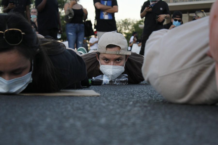A protestor lies down on the ground during a Black Lives Matter protest May 31, 2020. 
