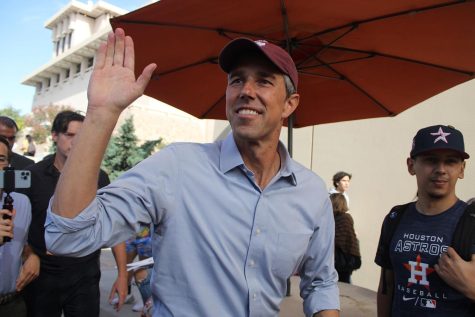 Gubernatorial candidate Beto O’Rourke high fives UTEP students as he makes his way to cast his vote.