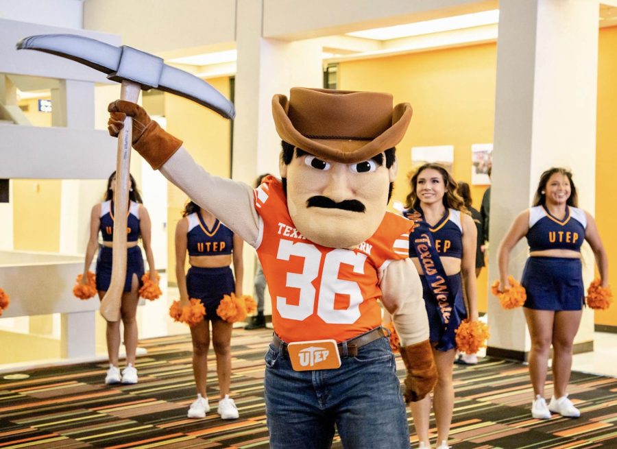 Pete brings the spirit to the Union East as the UTEP band performs the fight song.  