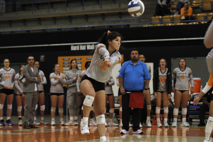 Defensive specialist Alyssa Sianez defends an attack by Middle Tennessee on Nov.4  