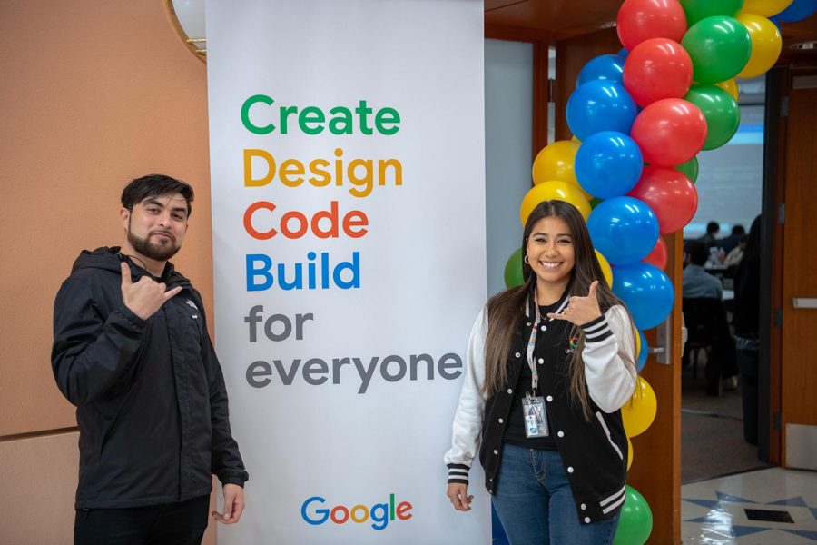 David Gamez, Vice President of the Google Developer Student Club at UTEP, and Arley Silva pose after being interviewed.