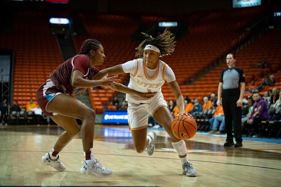 Jazion Jackson drives up towards the basket to create an opportunity to score.