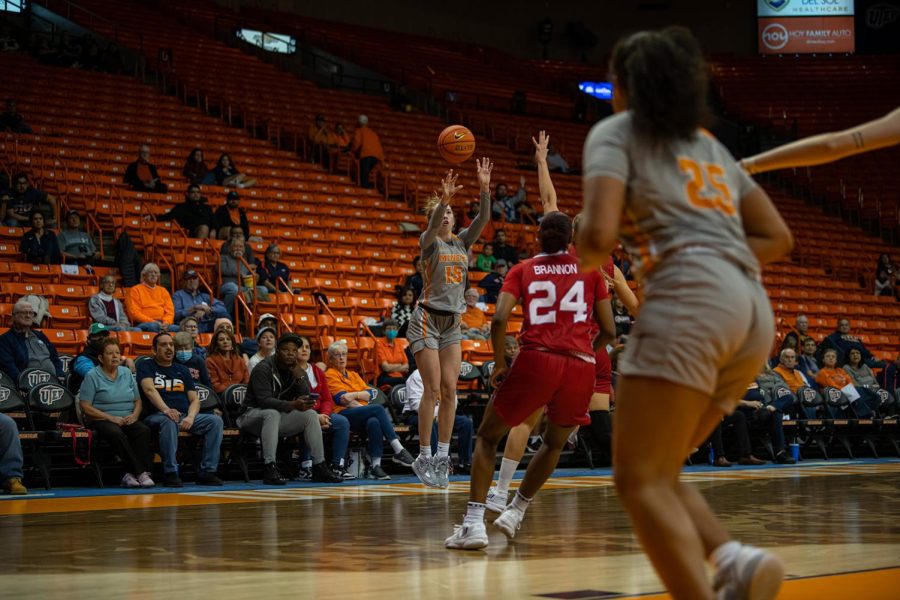 Junior guard Avery Crouse attempts to add on to the lead with a three pointer.