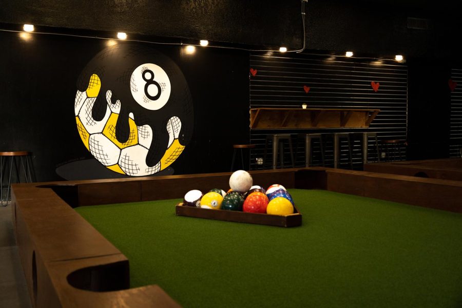 Kick social brings snook ball, a combination of pool and soccer where players must eliminate their balls from the table.  