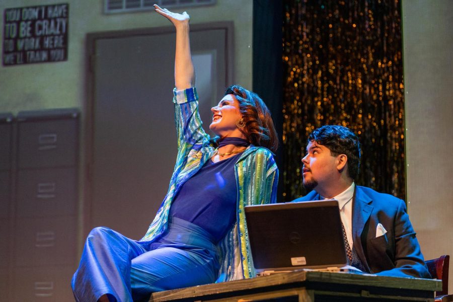 Actress Keri Baggs as Dee Dee Allen and Fernando Romer as Mr. Hawkins.  