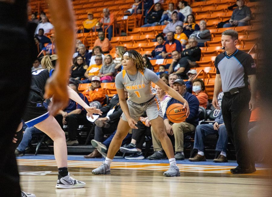 Junior guard Jazion Jackson builds up to shoot a three pointer on the court against No. 21 Middle Tennessee.  