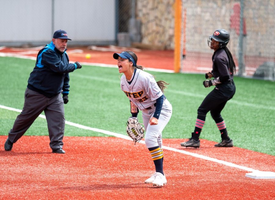 Infielder Peyton Angulo screams with excitement after an out against WKU.