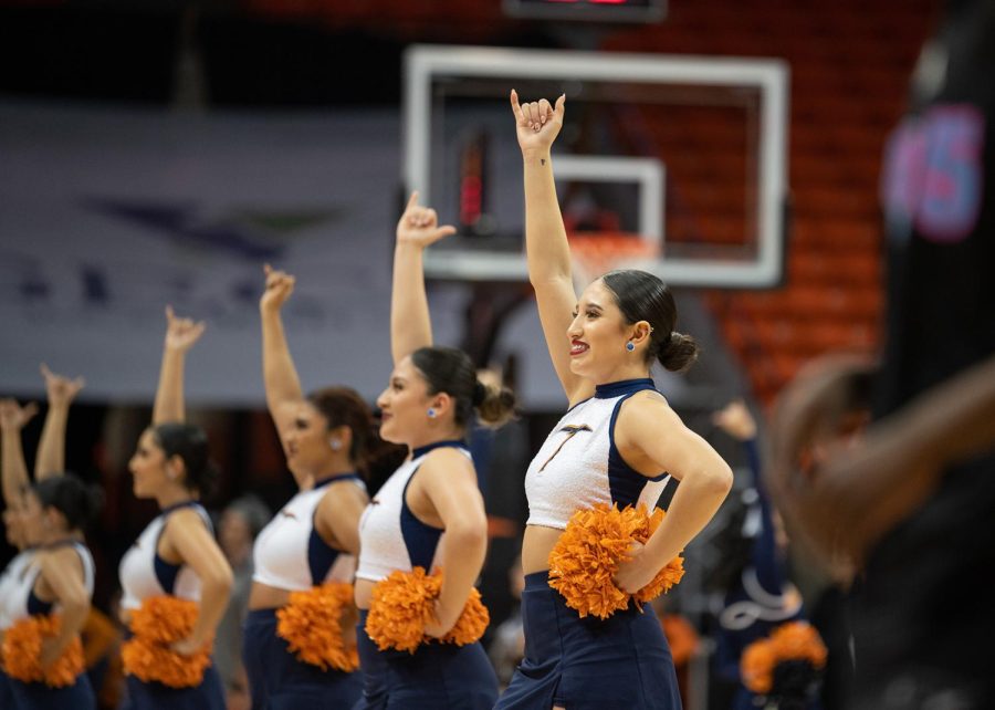 The UTEP dance team throw their picks up in support of the Miners prior to the game against FIU on Feb. 23.  
