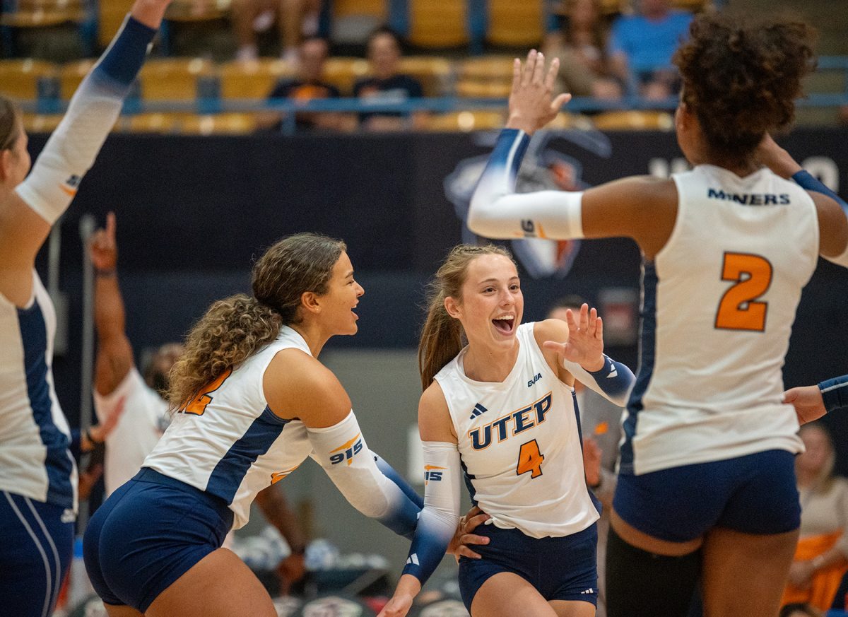 Libero/Defensive specialist, Ava Martindale, celebrates a score with her teammates during a set against San Francisco Aug. 31.  