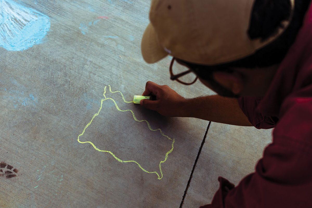 A UTEP student drawing SpongeBob. 