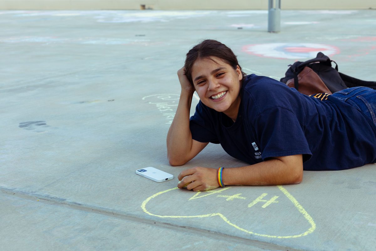 UTEP junior Hicsyl Falcon draws a heart with the initials of her and her partner.  