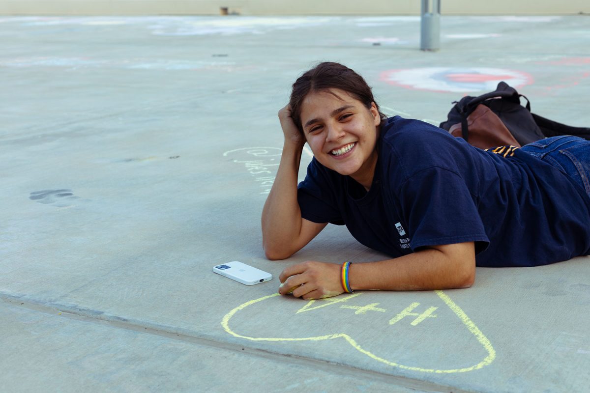 UTEP+junior+Hicsyl+Falcon+draws+a+heart+with+the+initials+of+her+and+her+partner.++