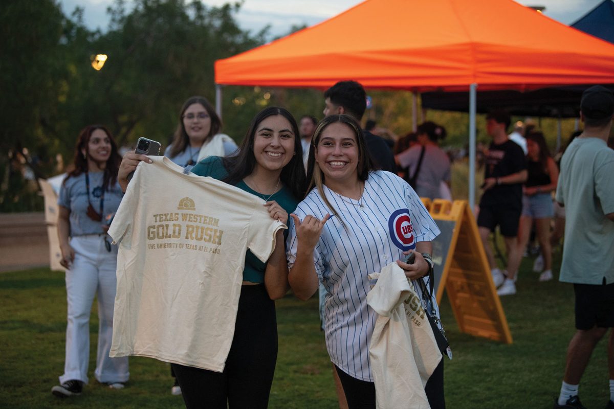 Students grabbing their T-shirts for Texas Western Gold Rush Aug. 28.